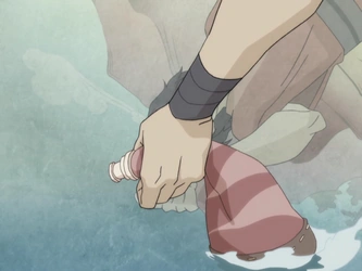 File:Wan replenishes a water skin.png