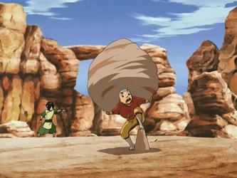 File:Aang carries a rock.png